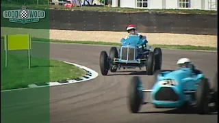 Pre-war Grand Prix cars four-wheel drift round Goodwood