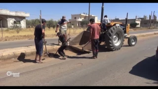 حملة تنظيف في بلدة أم ولد بريف درعا من مخلفات الغارات الجوية