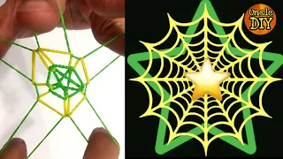 How to make a double stars rubber band spider web. Rubber bands trick.