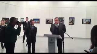 Новое видео покушения на посла России в Турции