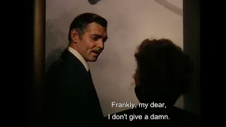 RHETT BUTLER, "Frankly, my dear, I don't give a damn!" - GONE WITH THE WIND (1939).