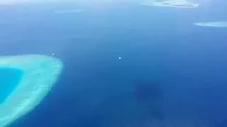 Seaplane flight over North Male (Kaafu) atoll 4k