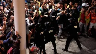 Chaos at Barcelona airport as protesters clash with police after independence leaders jailed
