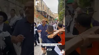 Ultra-orthodox Jews spit towards Christian pilgrims leaving Church of the Flagellation