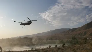 Boeing CH-47D “Chinook” helicopter fighting Snow Fire. 4k