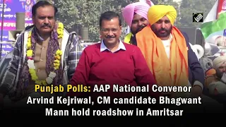 AAP National Convenor Arvind Kejriwal, CM candidate Bhagwant Mann hold roadshow in Amritsar