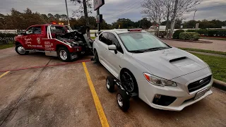 Towing an ABANDONED Subaru WRX!