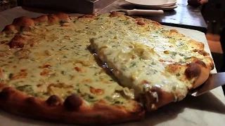 Artichoke Basille's famous creamy artichoke pizza