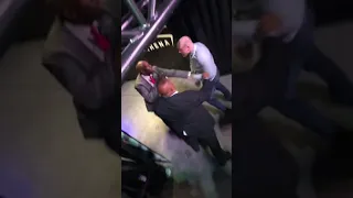 McGregor versus Khabib jumping over rail