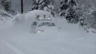 Nissan Armada 4x4 snow play in mountain road. Long version.