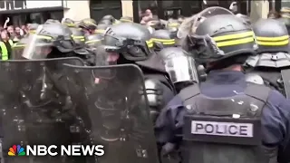 Thousands of protesters march in Paris to call out labor conditions