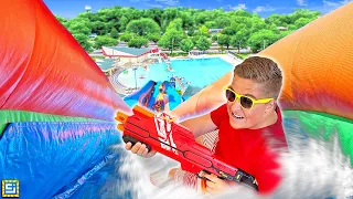 Giant Homemade Backyard Water Park Bounce House Slide Battle!