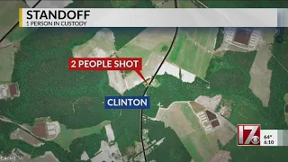 2 shot, armed man in custody after standoff in Sampson County