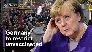 Covid: Unvaccinated banned from pubs and non-essential shops in Germany