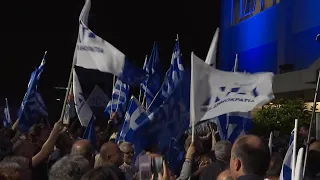 Greek New Democracy supporters celebrate big lead