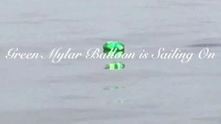 Music From the Waterways - Green Mylar Balloon is Sailing On