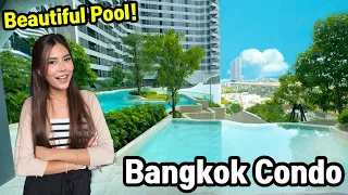 Beautiful round pool with Greenery Bangkok Condo close to BTS Station!