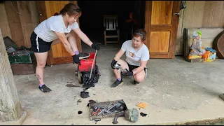 The mechanic girl helped the farmer repair the diesel engine that was difficult to explode