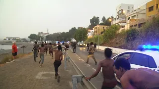 155 migrants force entry into Spain's Ceuta enclave | AFP
