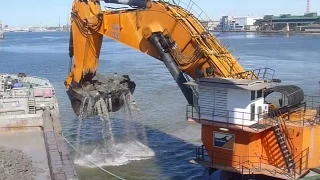 Monster Machine Backacter Goliath dredging in port of Klaipeda