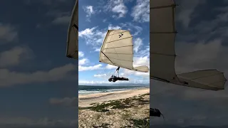 Landing a hang glider backwards