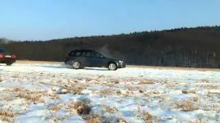 Audi A6 quattro vs  Subaru Outback on ice