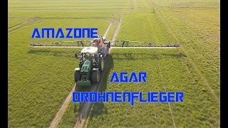 Johne Deere mit der Amazone UX 6201 Super.