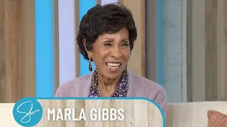 Sherri Gives Legend Marla Gibbs Her Flowers