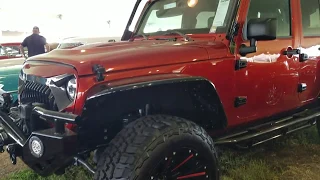 A custom Jeep Wrangler JK 6X6 with Blown HEMI at Mecum Kissimmee.