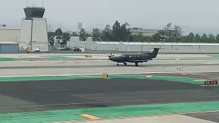 All black pc-12 takes off out of Santa Monica airport