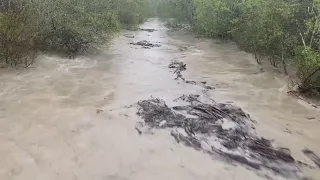 Atmospheric river floods California towns, brings rain, snow