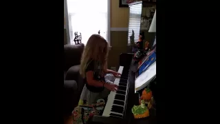 Shyla (8 years old) playing piano
