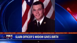 Widow of Locust Grove officer gives birth