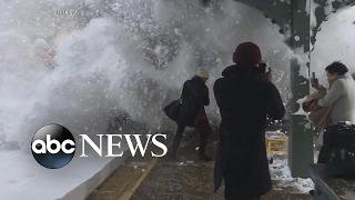 Ultimate snowball fight as train barrels into station
