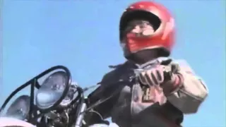 The Dirt Bike Kid flying away from the police