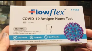 FlowFlex COVID-19 Antigen Home Test with extraction buffer tube.