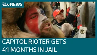 US Capitol Riot: 'QAnon Shaman' Jacob Chansley sentenced to 41 months in prison | ITV News