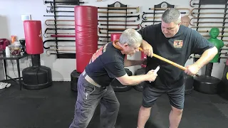Cane Self Defense with knowing the dangers of pulling an attacker in close by the crook.