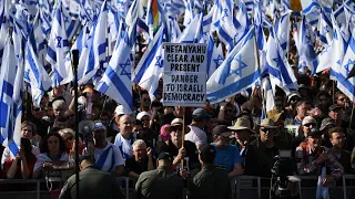 Netanyahu delays Israel judicial overhaul after mass protests