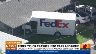 3 hurt after Fedex truck crashes into Tempe home