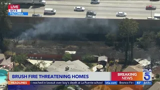 Brush fire threatens homes in Pacoima