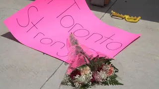 Local residents pay respects at scene of Toronto shooting