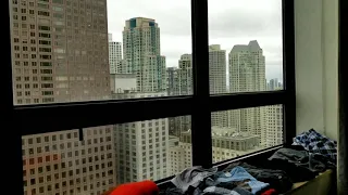 Tall building swaying in Chicago wind storm