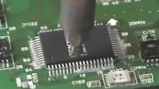 Hand soldering surface mount QFP with solder paste and hot air tool to reflow