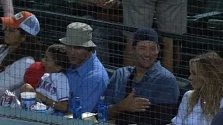 McConaughey and Romo take in a ballgame