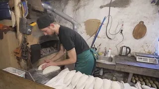 Ukrainians bake bread for the frontline