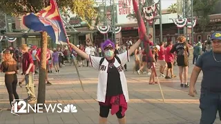 Fans celebrate Diamondbacks win against Phillies