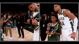 Giannis Antetokounmpo autographs his shoes to give to a young Milwaukee  Bucks fan!!