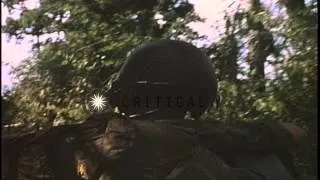 11th Armored Cavalry Regiment of the US Army passes through a Cambodian forest on...HD Stock Footage