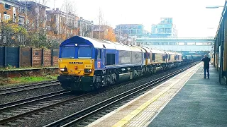Imported Sheds 66179, 66244 & 66224 are hauled through Kensington Olympia by 66051 13/12/21